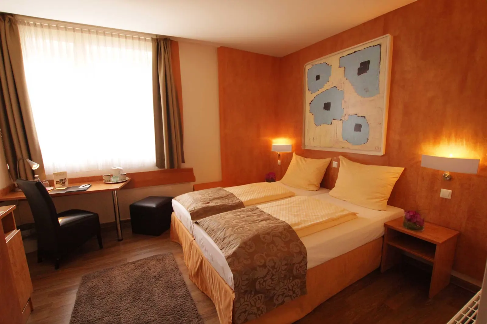Gemütlich eingerichtetes Zimmer im Hotel Alt Speyer
